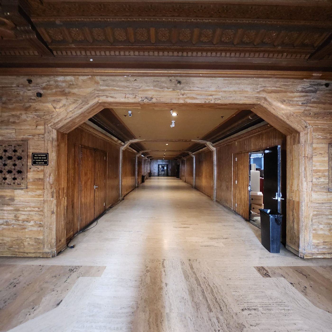 The marble ground-floor corridor